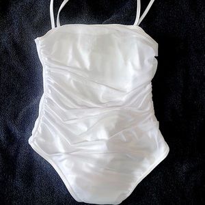 White bodysuit from PrettyLittleThing. Super flattering